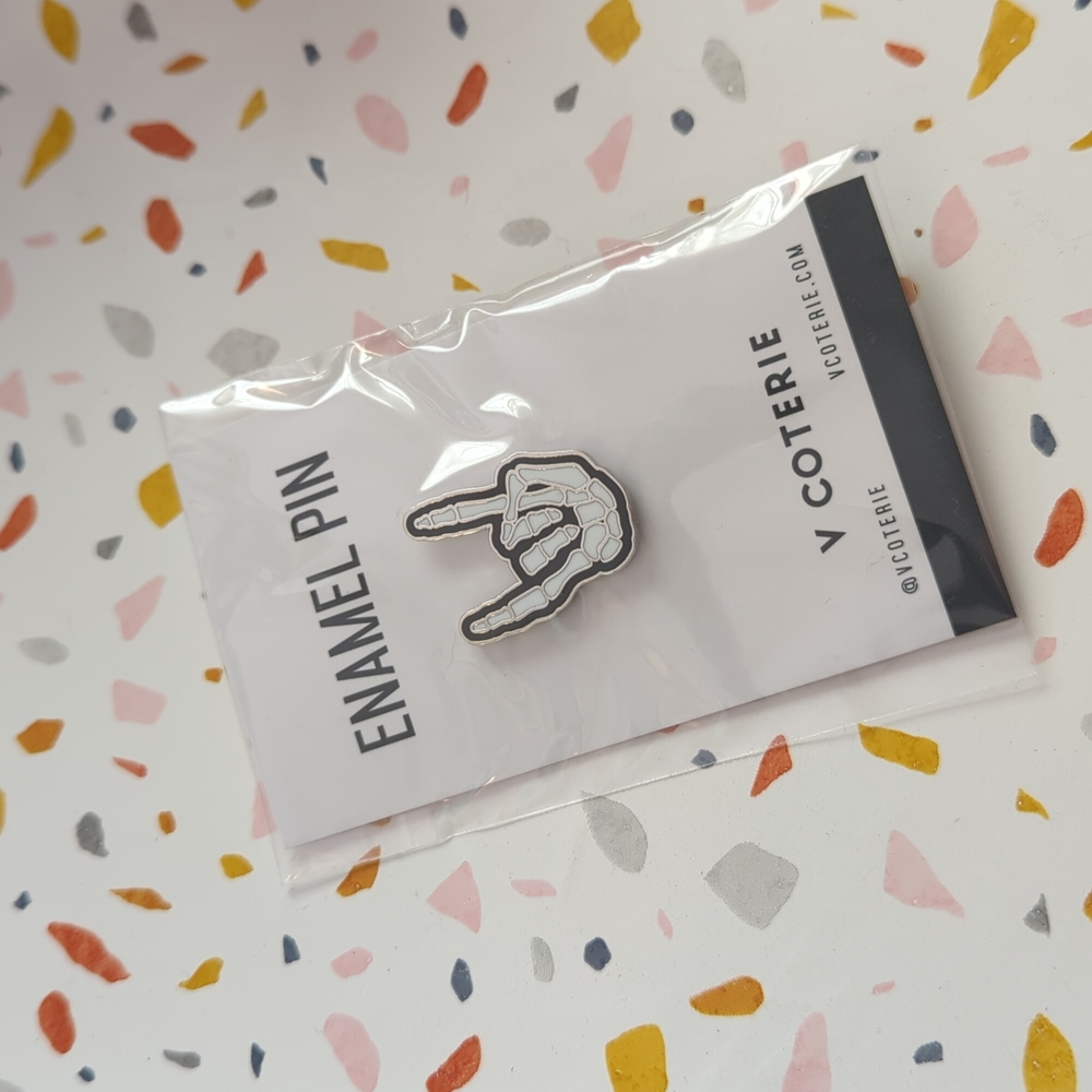 FIGS V COTERIE SKELTON ENAMEL PIN